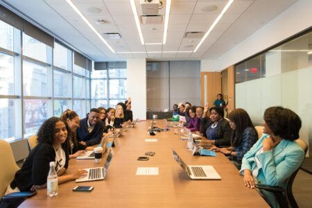 ChatGPT Enterprise Adoption Surges Among Fortune 1000 Companies Business executives discussing strategy in modern corporate boardroom