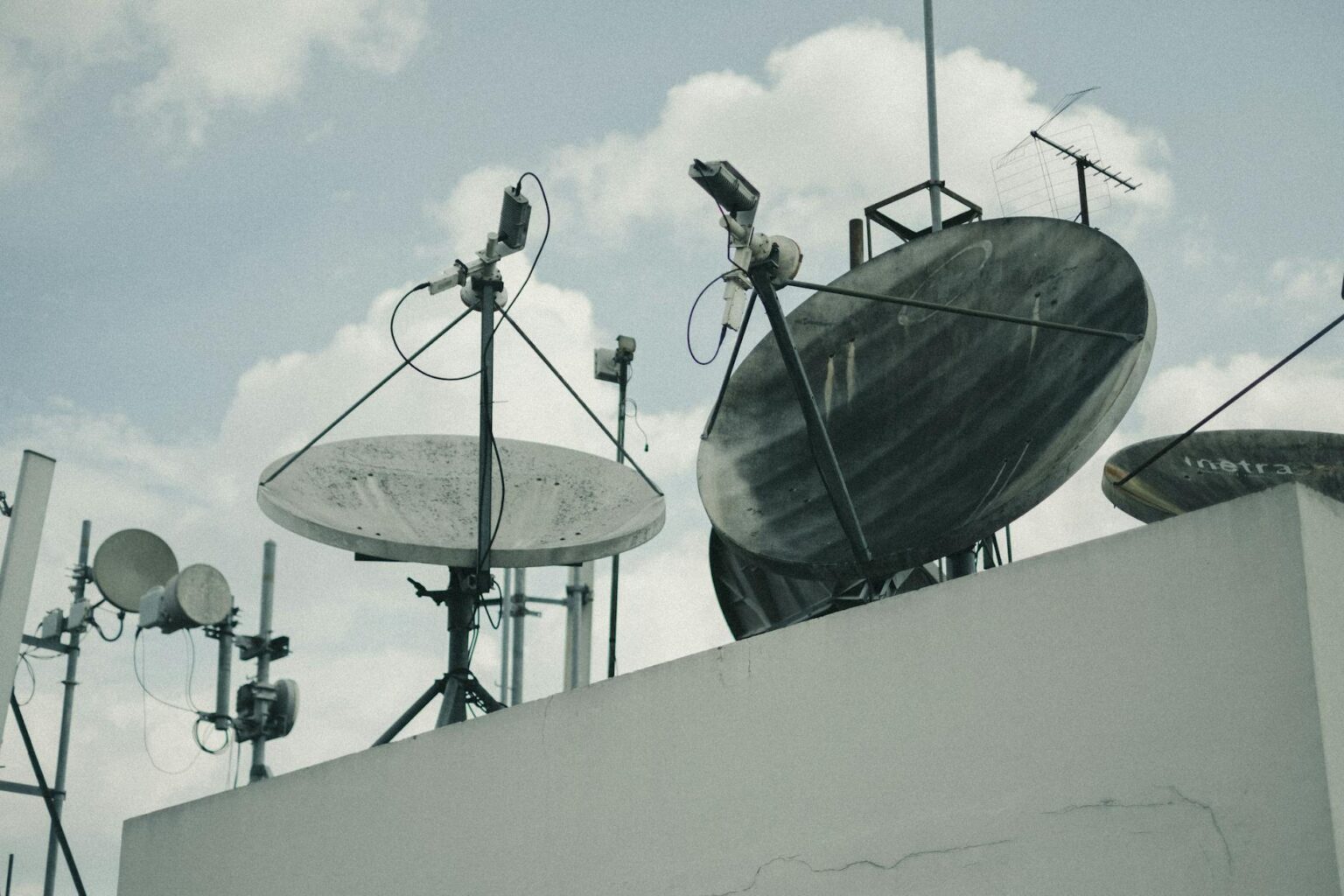 Satellite dish installed in rural countryside setting for internet connectivity