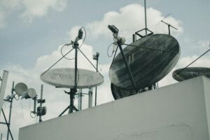 Satellite dish installed in rural countryside setting for internet connectivity
