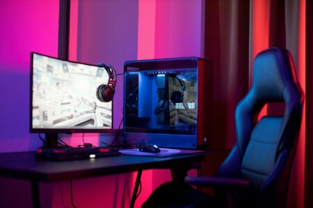 Why Gaming Companies Are Building Physical Esports Arenas in Shopping Malls Modern gaming computers and monitors set up in a professional esports arena environment