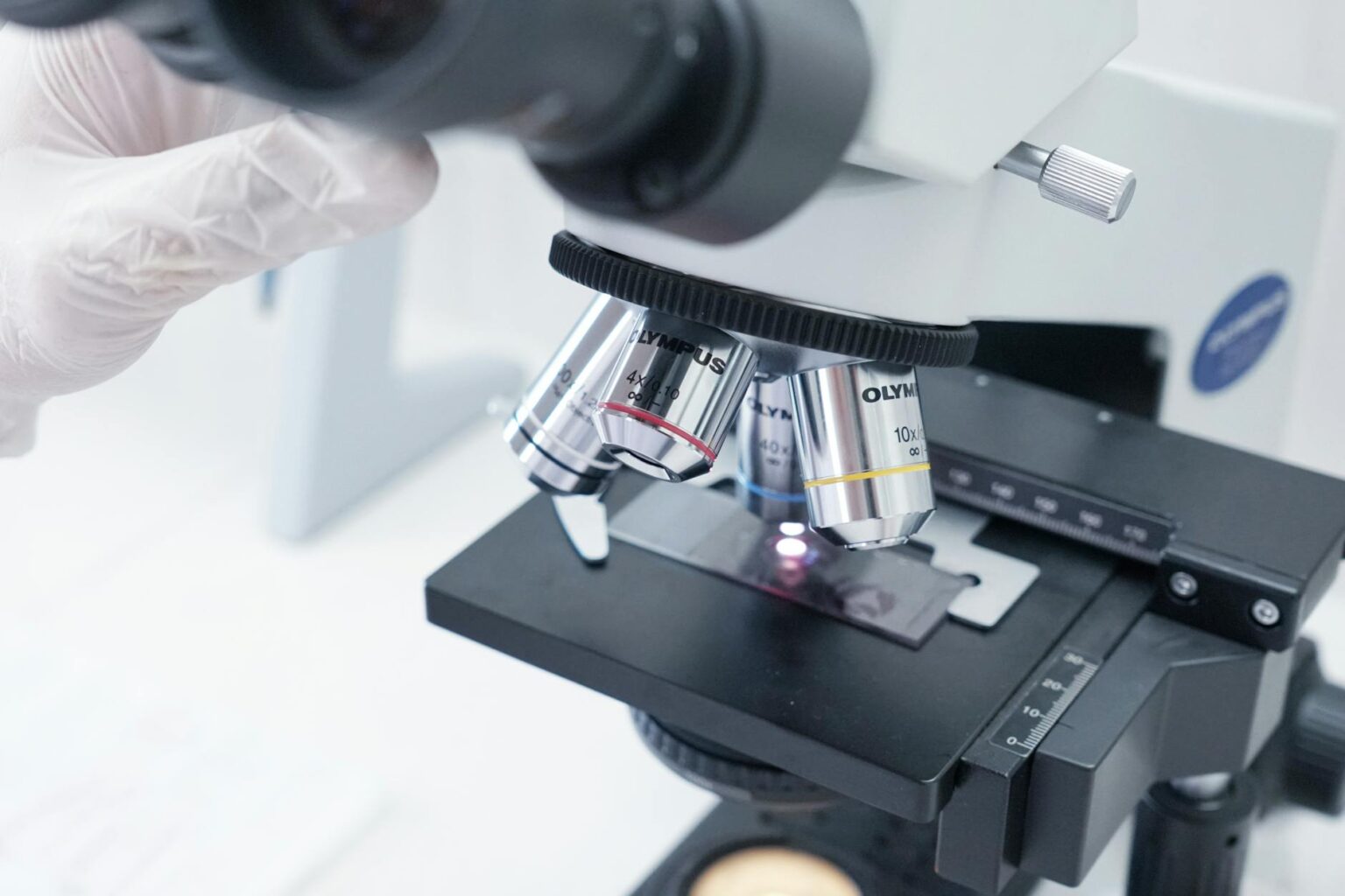 Modern laboratory microscope representing scientific research and protein structure analysis