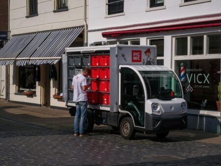 European Cities Begin Banning Gas-Powered Delivery Vehicles Downtown Electric delivery truck parked on European city street
