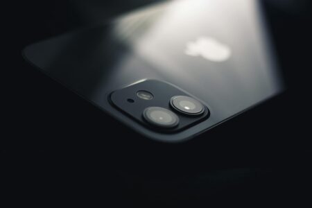 Close-up view of a smartphone camera system with multiple lenses