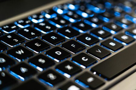 Testing the New MacBook Pro M4: Performance Gains Worth the Upgrade Close-up view of MacBook Pro keyboard and trackpad showing premium build quality