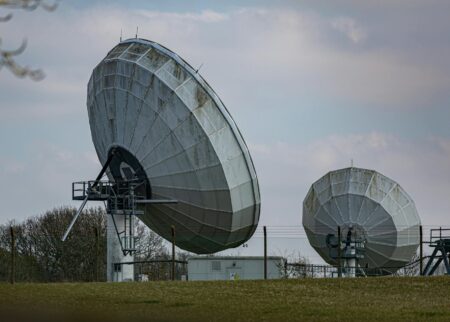 Weather satellite monitoring atmospheric conditions and storm systems from space