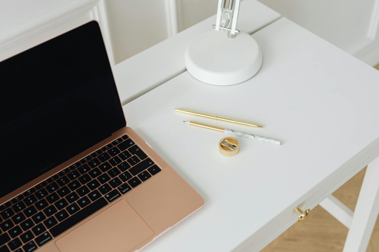 Modern laptop computer open on a clean desk workspace setup
