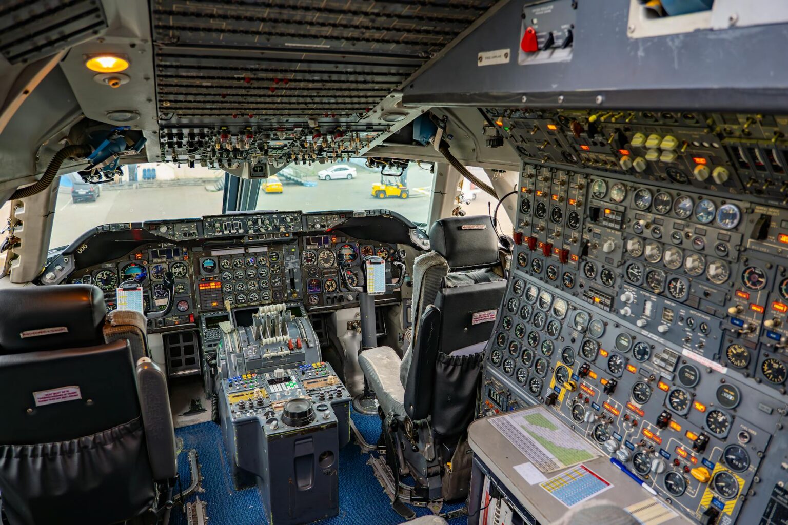 Modern aircraft cockpit with advanced flight instruments and controls