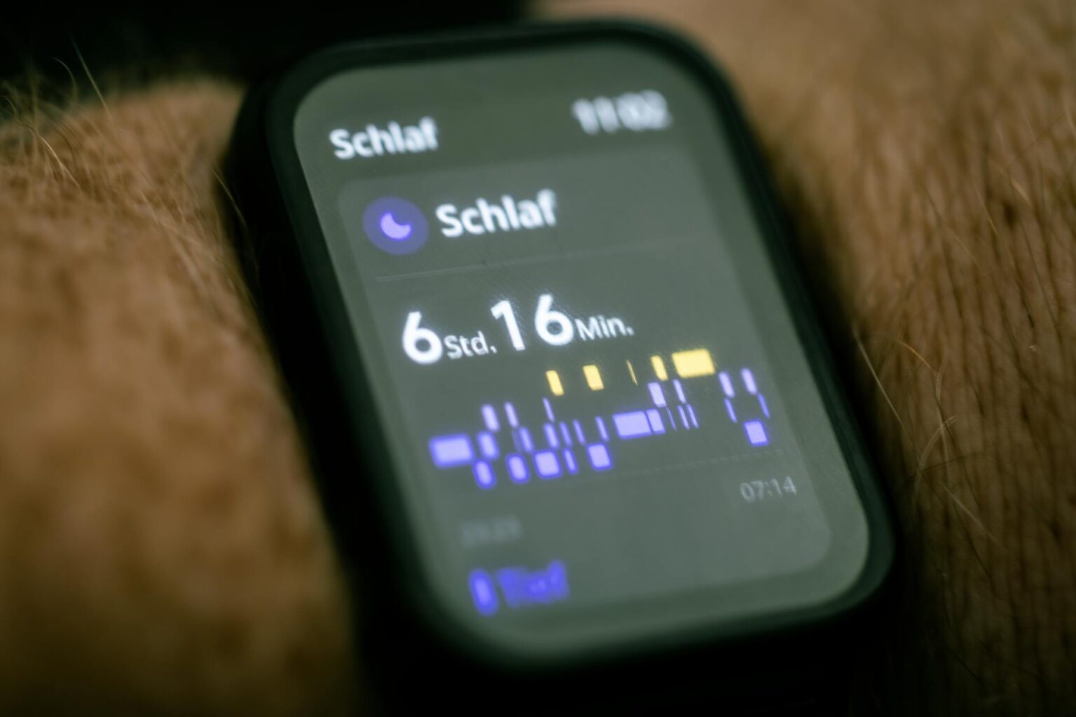 Apple AirTags vs Samsung Galaxy SmartTag2: Which Tracker Wins Small electronic tracking devices displayed on a white surface
