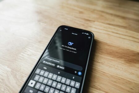 The Growing Trend of Digital Detox Apps Among Professionals Person checking smartphone showing various app notifications and screen time statistics