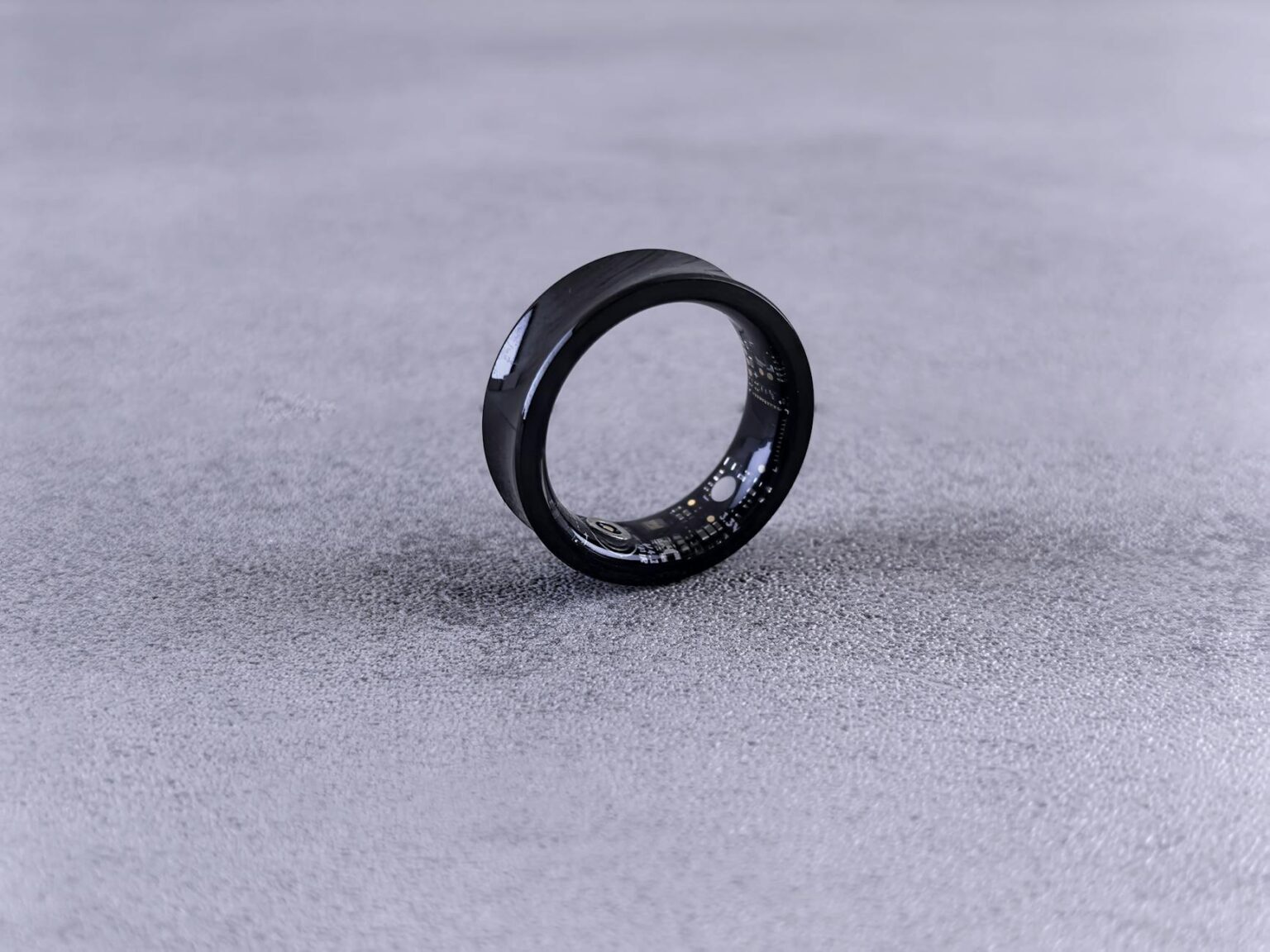 How Smart Rings Are Replacing Fitness Trackers for Health Monitoring Person wearing a sleek smart ring on their finger showing the minimal, comfortable design