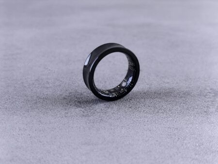 How Smart Rings Are Replacing Fitness Trackers for Health Monitoring Person wearing a sleek smart ring on their finger showing the minimal, comfortable design