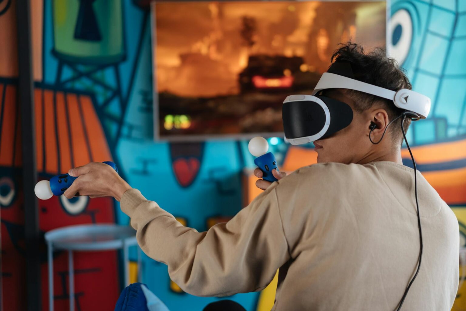 The Best Budget VR Headsets Under $300 for Gaming Person wearing VR headset while gaming in modern living room