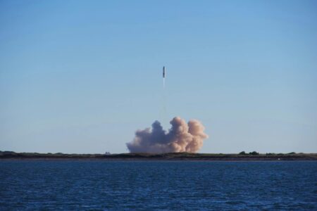 Cowboy Space Secures $275M for Orbital Data Centers Rocket launching into space against blue sky