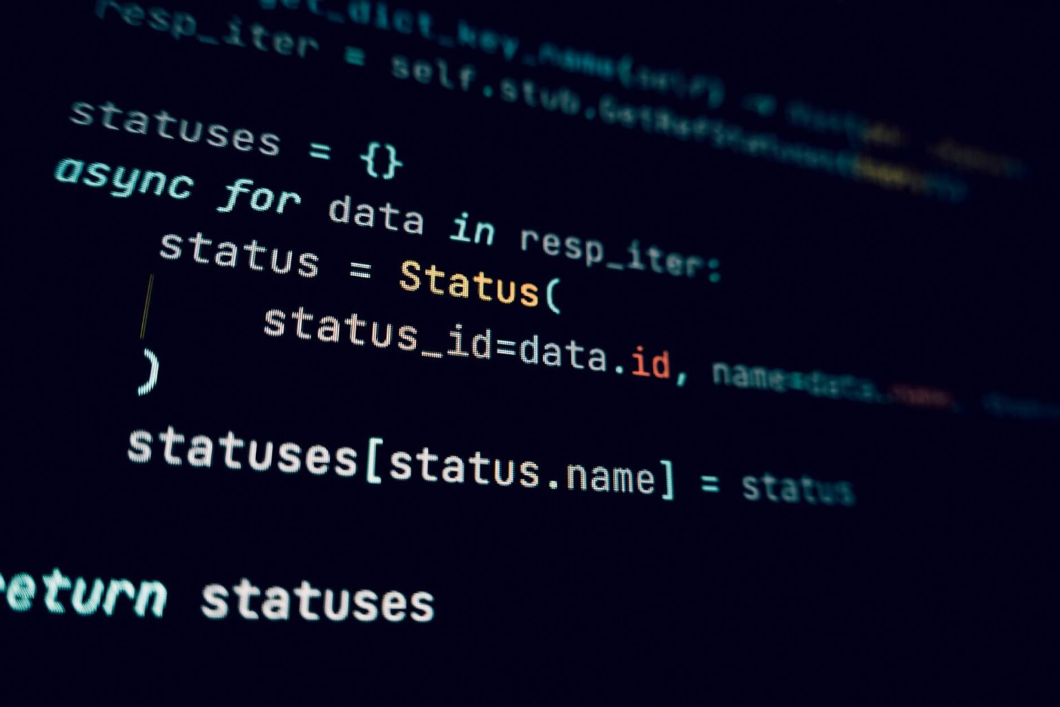 Developer working on secure code implementation at computer workstation
