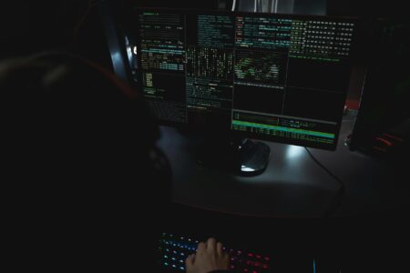 Close-up view of computer code on screen showing security-related programming