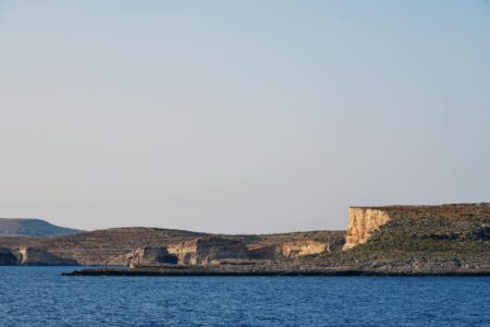 Malta Gets Free ChatGPT Plus Access With AI Education Requirement Aerial view of Malta's coastline and historic architecture