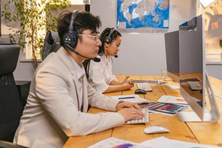 White-collar workers at office desks representing knowledge worker employment