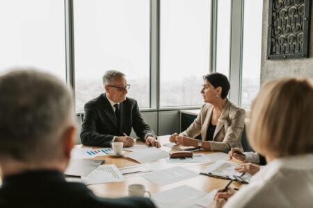 eBay Dismisses GameStop Acquisition Bid as Corporate Theater Corporate boardroom with empty chairs around conference table