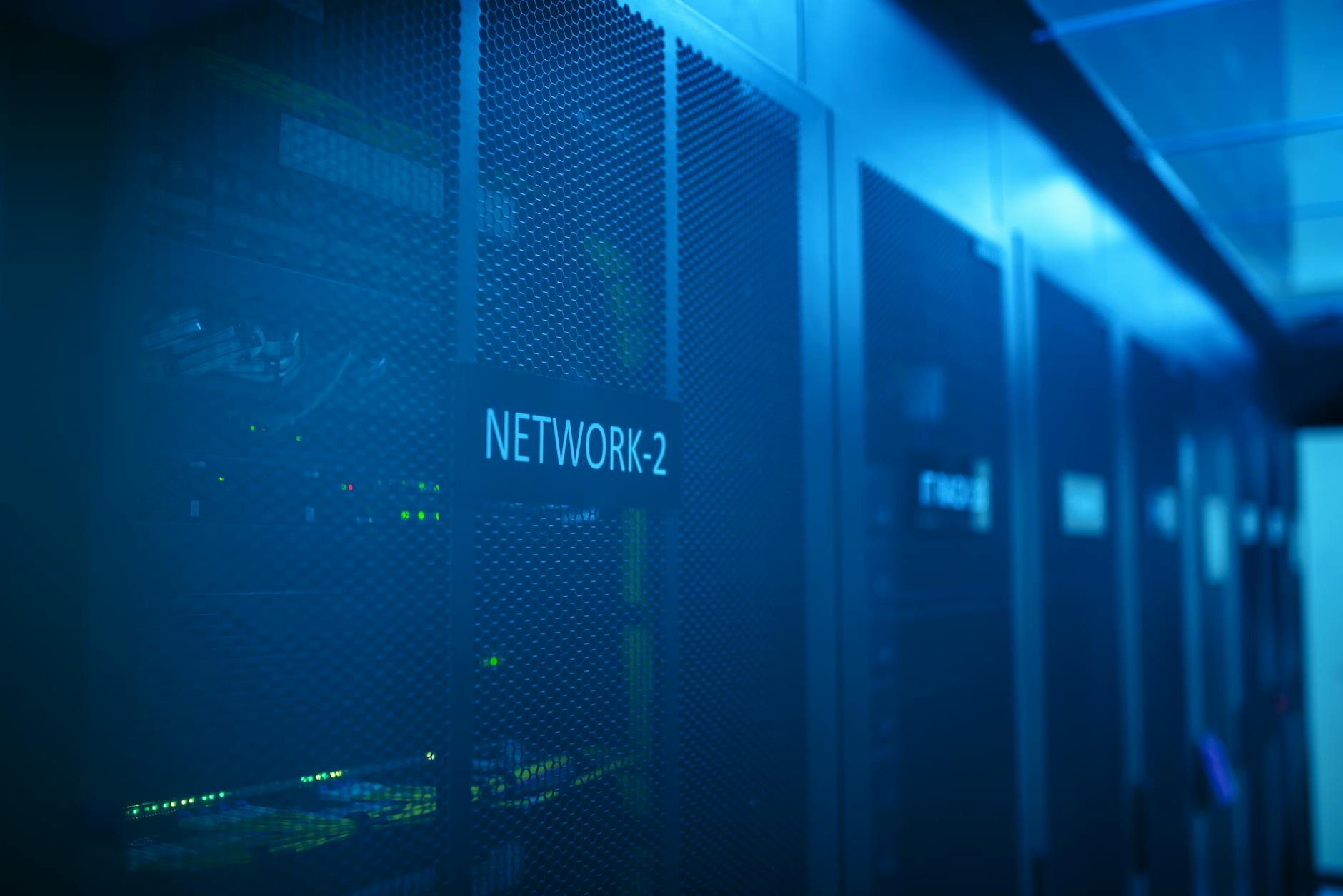 Rows of servers in modern data center facility