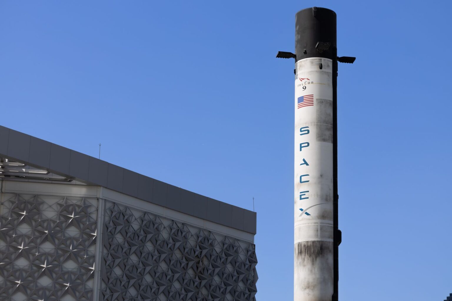 SpaceX rocket launching against a clear sky representing the company's record IPO milestone