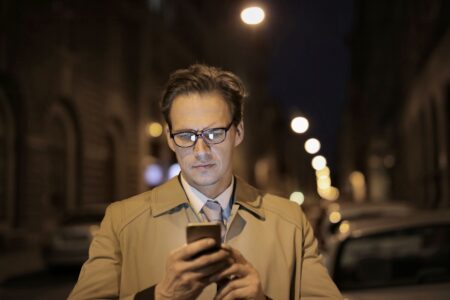 Close-up of modern smart glasses resting on a flat surface