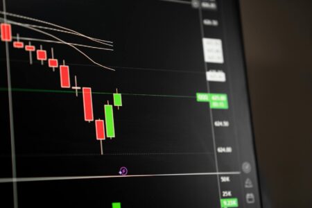 Stock market trading screens showing IPO activity and financial data