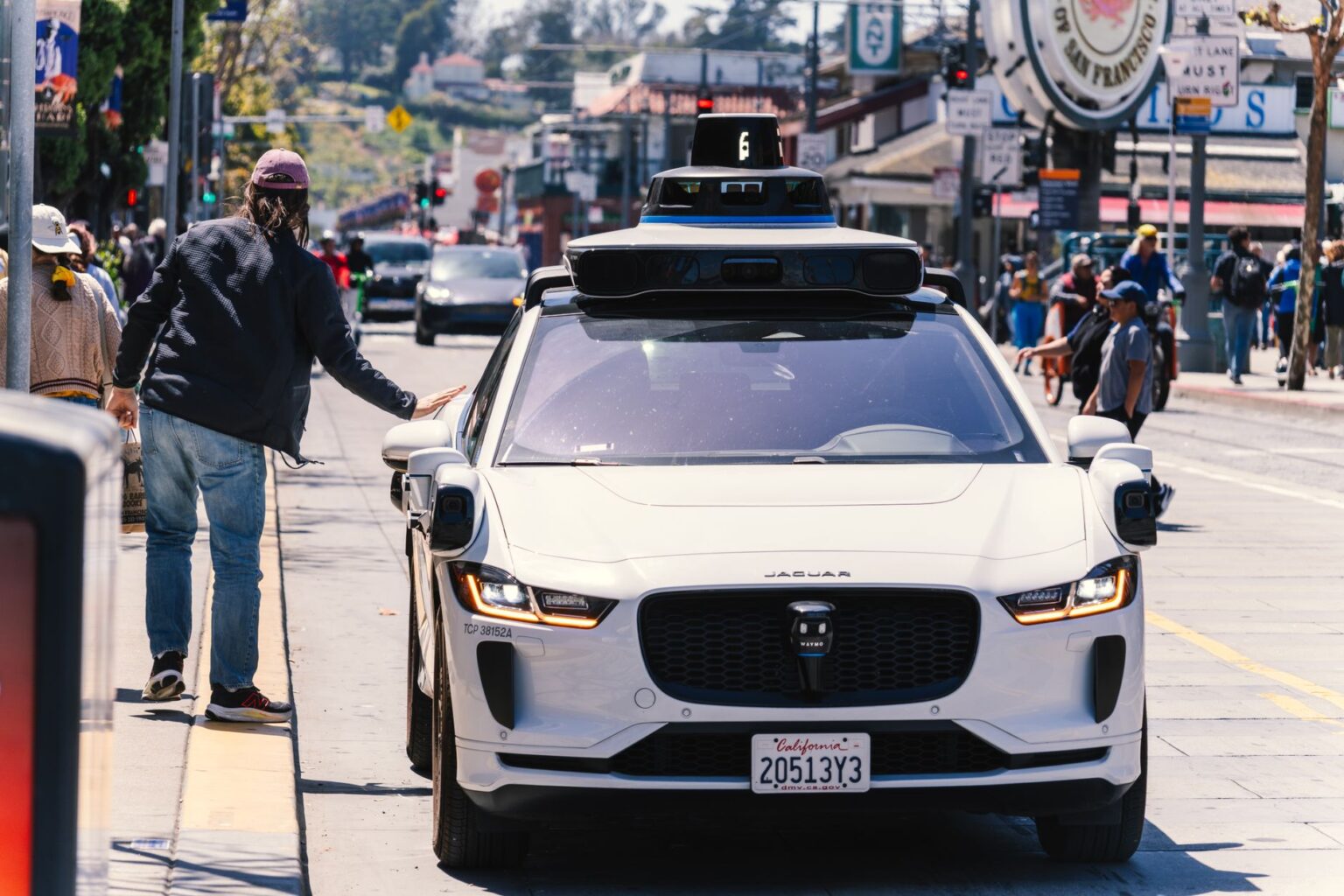 A self-driving autonomous vehicle on a city street