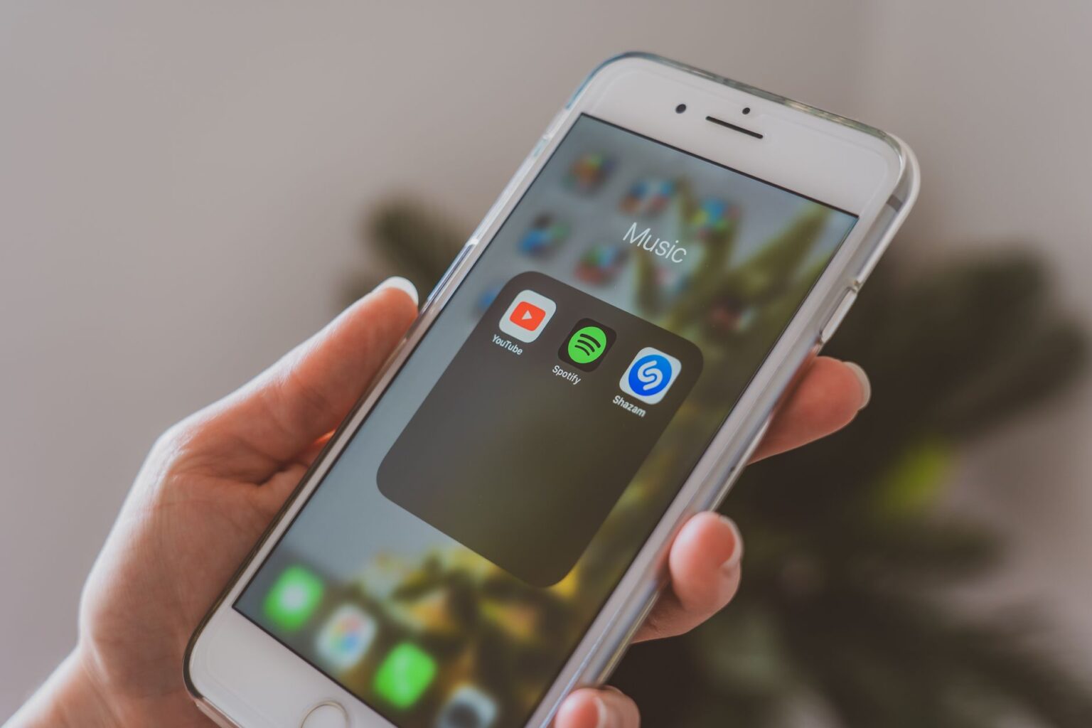Person scrolling through a streaming app on a smartphone