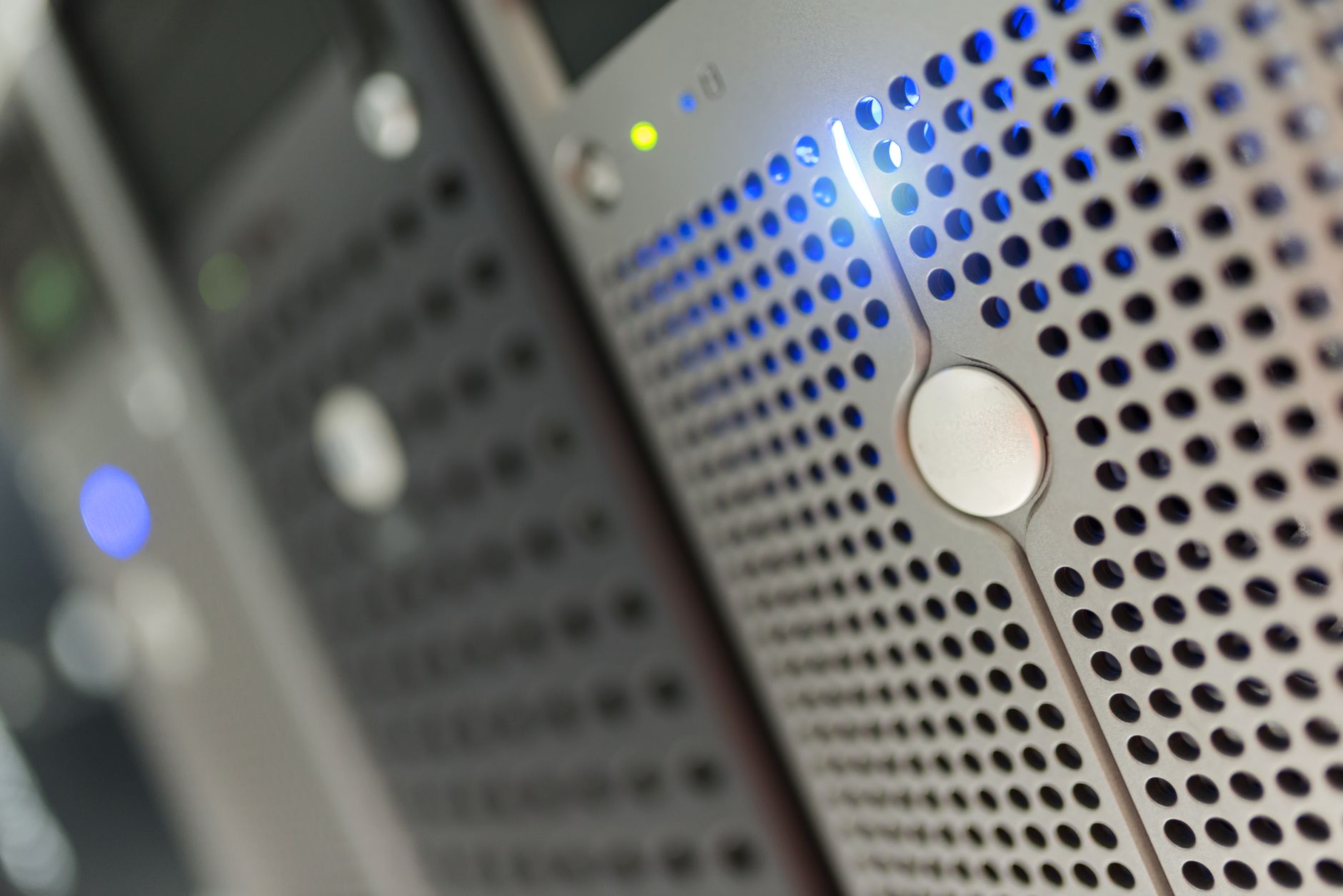 Rows of servers inside an enterprise data center representing AI infrastructure costs
