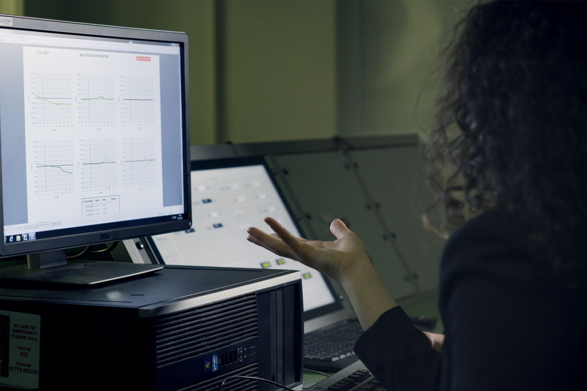 Engineer working at a computer hardware design workstation