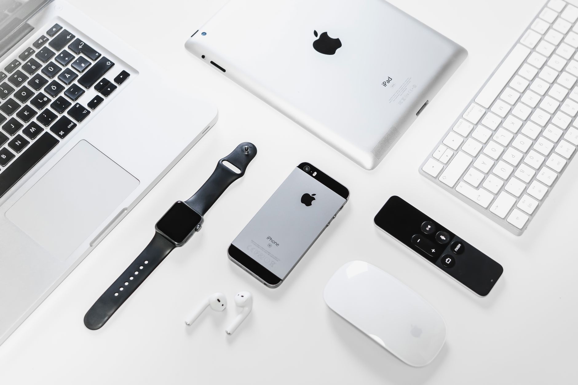 Minimalist tech product on a clean white surface representing Apple design