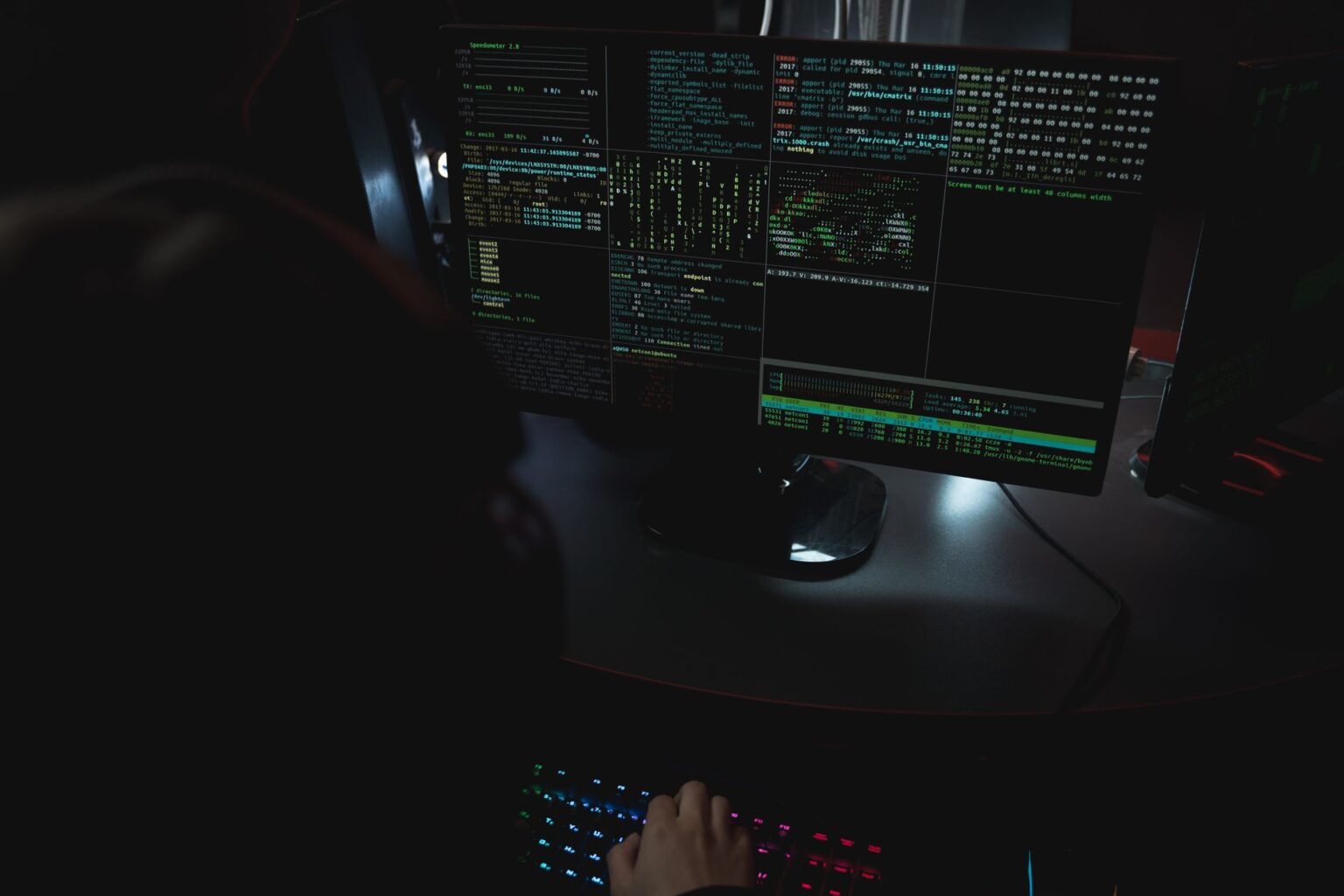 Why Google Gives Hacker Groups Codenames Instead of Real Ones A dark computer screen displaying cybersecurity threat data and code