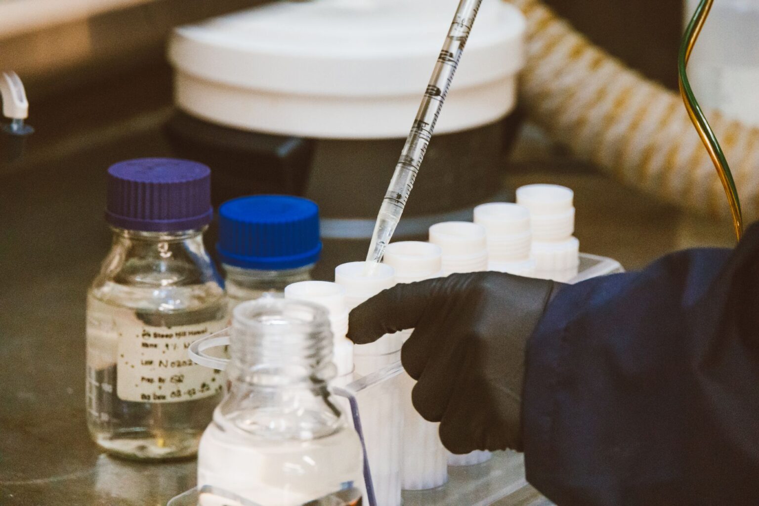 AI Has Built Its First Virus, Raising New Biosecurity Concerns Scientist examining DNA sequences in a research laboratory