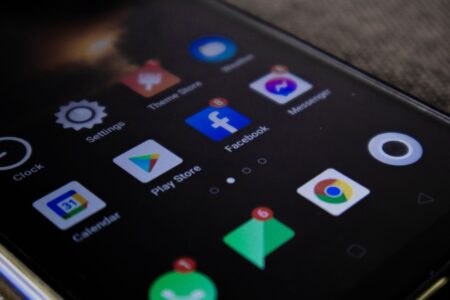 Person scrolling through a social networking app on a smartphone