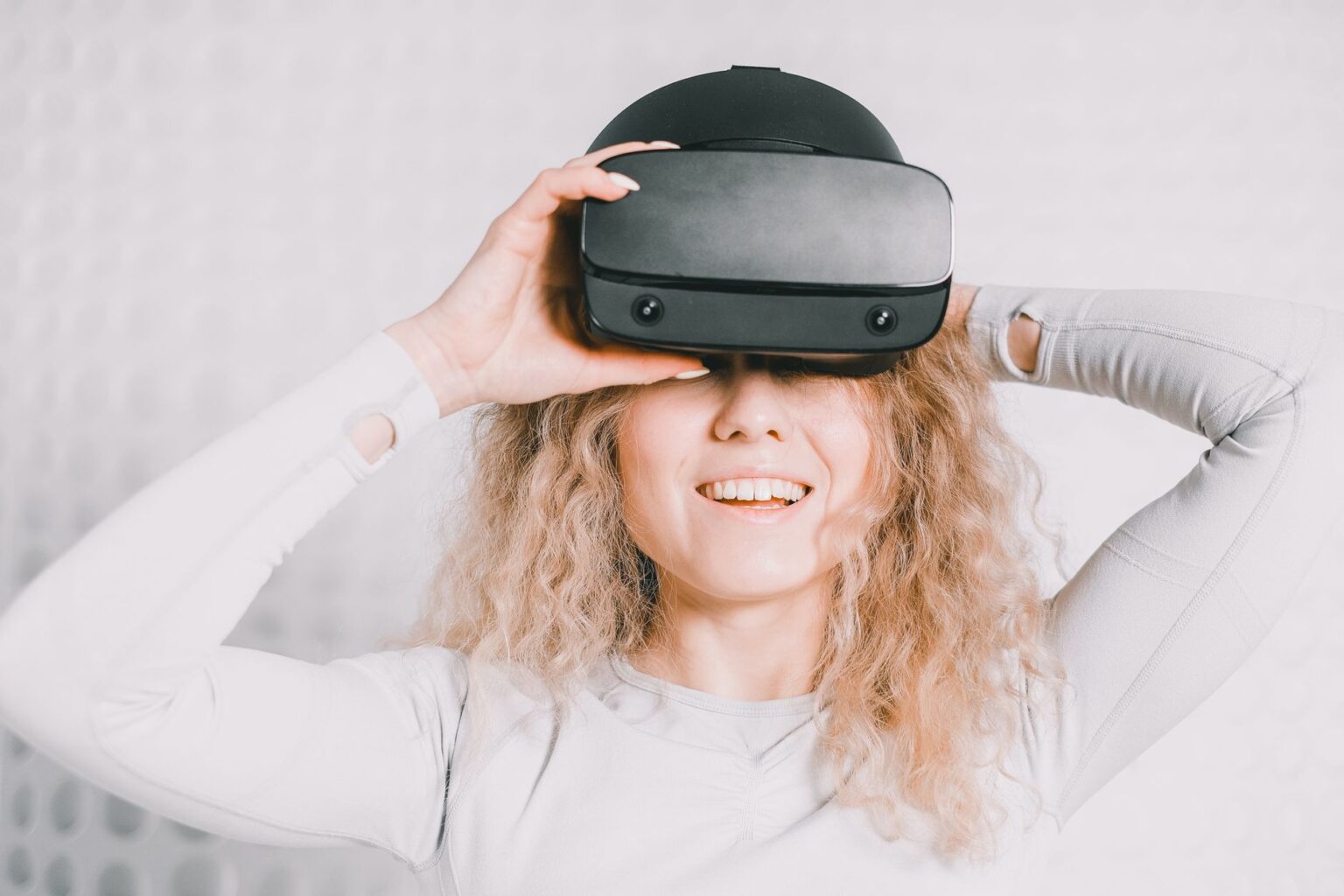 Polyarc, Studio Behind Moss, Shuts Down After VR Run Person wearing a VR headset in a darkened room