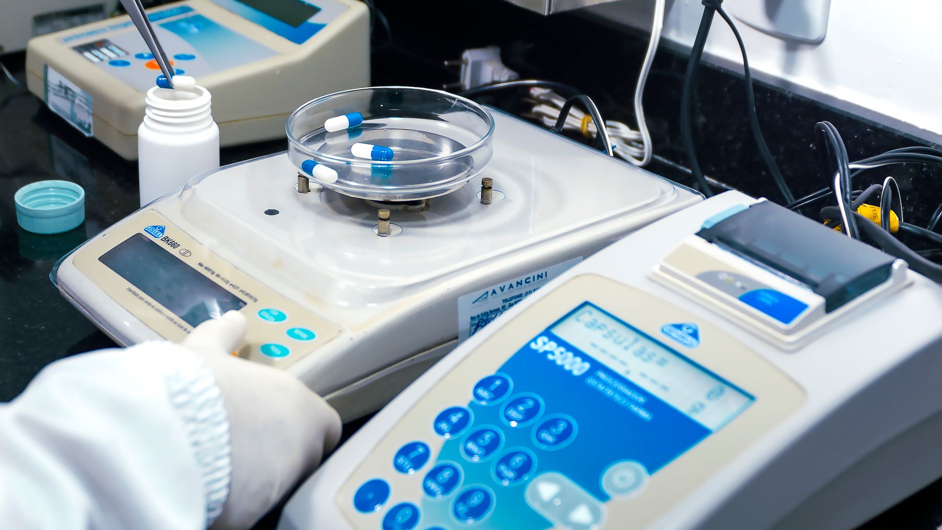 Scientist working with laboratory equipment in a biotech research facility
