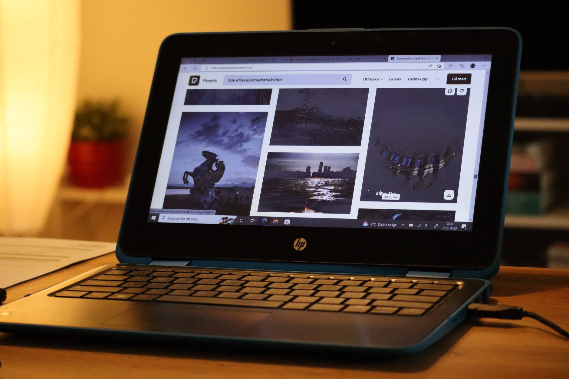 A laptop displaying a clean, minimal browser-based operating system interface